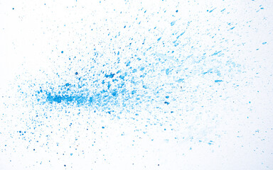 blue watercolor spatter background on white paper