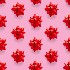 Seamless regular creative Christmas pattern with New Year decorations. xmas Modern Seamless pattern made from christmas decorations. pink background