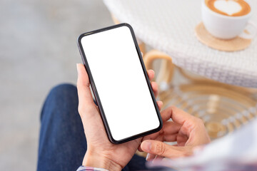 cell phone mockup blank white screen.woman hand holding texting using mobile on desk at coffee shop.background empty space for advertise.work people contact marketing business,technology
