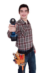 Worker holding cordless drill