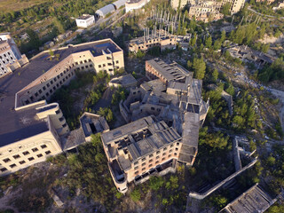 Fototapeta premium Abandoned construction site of Hospital. (aerial drone image)Abandoned at 1991,during Ukrainian undependence crisis. Kiev Region,Ukraine