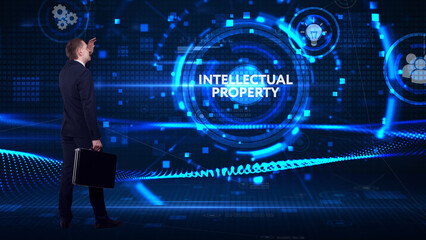 Business, technology, internet and network concept. Young businessman thinks over the steps for successful growth: Intellectual property