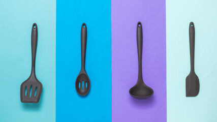 A set of kitchen accessories in multi-colored blue tones.