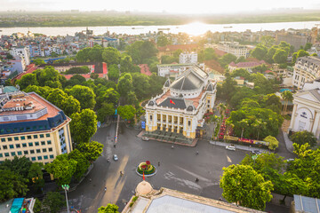 Aerial skyline view of Hanoi city, Vietnam. Hanoi cityscape by sunset period at August Revolution Square, with Hanoi Opera House