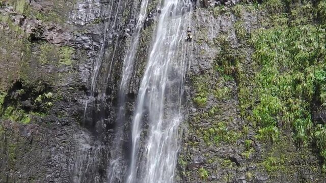 Rappelling down Ravine Blance, Reunion Island's highest waterfall, over 300m.