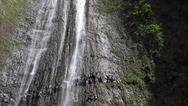 Rappelling down Ravine Blance, Reunion Island's highest waterfall, over 300m.
