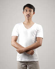Young men in empty white T-shirts, stylish and posing like famous T-shirt models. Men's t-shirt template and mockup design for print. photo shoot models isolated white background.