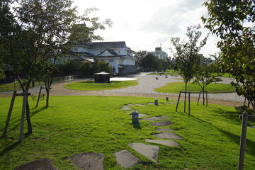 Beautiful Japanese garden with a pond and trees, leaves, nature landscape in Toyama castle, Japan