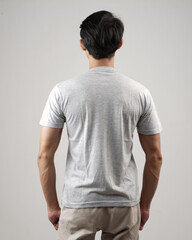 Young men in empty gray T-shirts, stylish and posing like famous T-shirt models. Men's t-shirt template and mockup design for print. photo shoot models isolated white background.