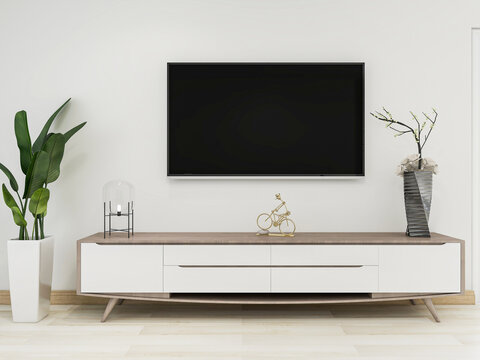 There are cloth sofa and table in the clean living room