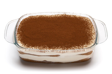 Traditional Italian Tiramisu dessert in glass baking dish isolated on white background with clipping path
