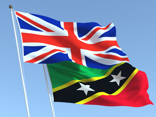 The flags of United Kingdom and Saint Kitts and Nevis on the blue sky. For news, reportage, business. 3d illustration