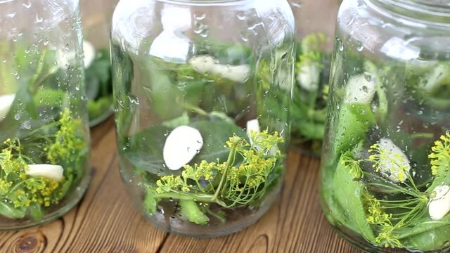 Preservation of cucumbers for the winter. Jars of garlic and spices for cucumbers, food, traditional