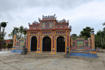 Hoi An, Vietnam, February 21, 2020: Main entrance gate of Chùa Phước Lâm temple. Hoi An, Vietnam