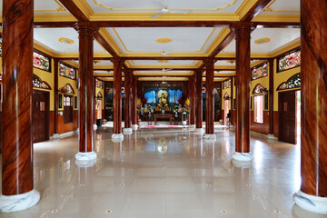 Fototapeta na wymiar Hoi An, Vietnam, September 20, 2020: Main hall of Tinh Xá Ngoc Cam temple. Hoi An, Vietnam