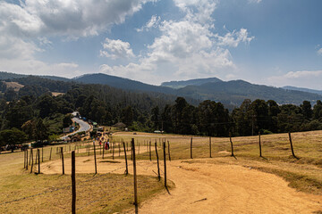 Fototapeta premium Tourists walking Pykara shooting point