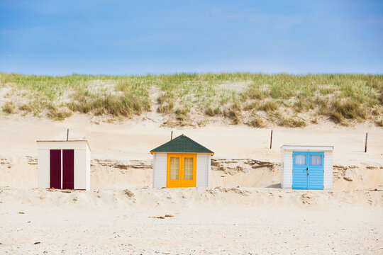 houses on the beach with blue sky