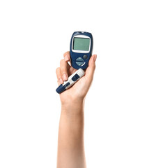 Female hand with glucometer and lancet pen on white background. Diabetes concept