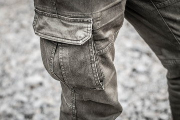 mens tactical pants, pants pocket close up, soft focus