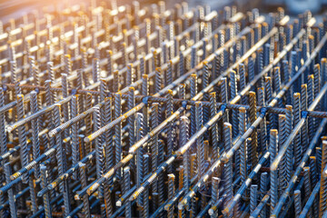 Industrial background. Rebar texture. Rusty rebar for concrete pouring. Steel reinforcement bars. Construction rebar steel work reinforcement. Closeup of Steel rebars.