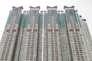 Residential area in old apartment with windows. High-rise building, skyscraper with windows of...