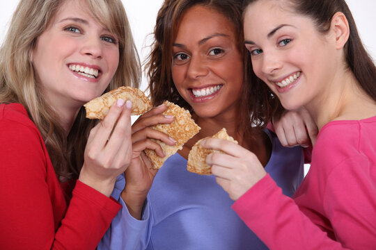 Three Friends Eating Pancakes