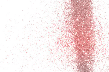 Pink glitter sparkles on white background