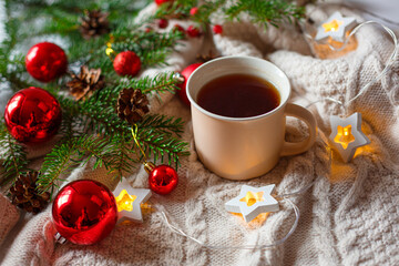 Christmas background tea Cup Christmas toys flat lay, red toys