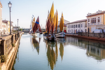 Colorful Sailboat in canal harbor of Cesenatico, Emilia Romagna, Italy