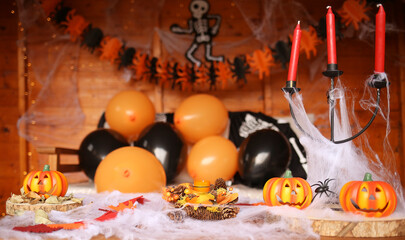 Halloween decorations balloons, pumpkins, spider web