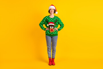 Full size photo of positive girl enjoy x-mas christmas newyear jolly theme party put hands waist wear reindeer decor pullover santa claus headwear isolated bright shine color background