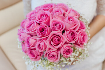 bride holding bouquet, bouquet of pink roses, wedding day, the bride's bouquet