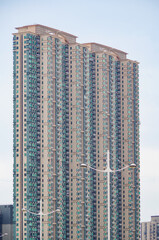 Residential area in old apartment with windows. High-rise building, skyscraper with windows of...