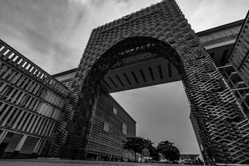 a black and white photo of a big metal archways