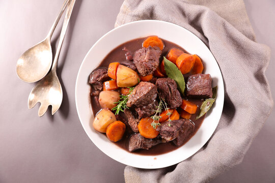 beef cooked with wine sauce and carrot