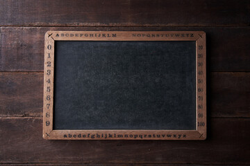 mini blackboard on wood background