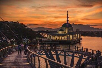 The floating mosque of Kuching and The Darul Hana Bridge during sunset
