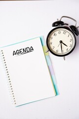 Agenda wordings on a notebook on a table