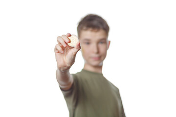 boy holds bitcoin on white isolated background