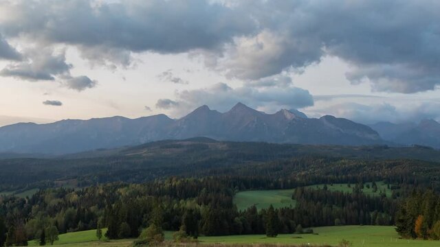 Time lapse view of morning sunrise over Belianske Tatras mountains from Lapszanka, Poland
