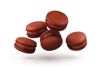 Chocolate macaroons fly on a white background. Beautiful macaroons.