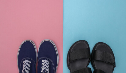 Sandals and sneakers on a blue-pink pastel background. Shoes. Top view