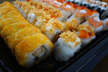 various of sushi roll are ready to be served                               