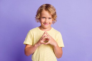 Portrait of small kid look in camera planning joke wear casual style clothes isolated over violet...