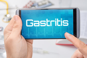 Smartphone mit dem Text Gastritis auf dem Display