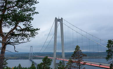 The High Coast Bridge in Sweden. It is a suspension bridge over the Angerman river between Kramfors and Harnosand municipalities in Adalen.