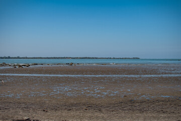 Low tide at a peaceful and calm beach, Ngwesaung, Irrawaddy, Myanmar