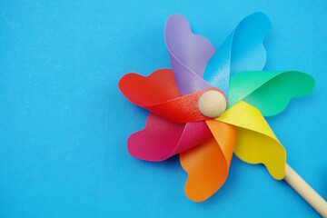 colorful pinwheel with space copy isolated on blue background