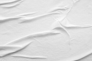 Blank white crumpled and creased paper poster texture background