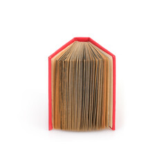 Book in red cover with white sheets isolated on a white background